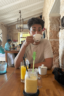 narractive tours aruba guy drinking coffee during break